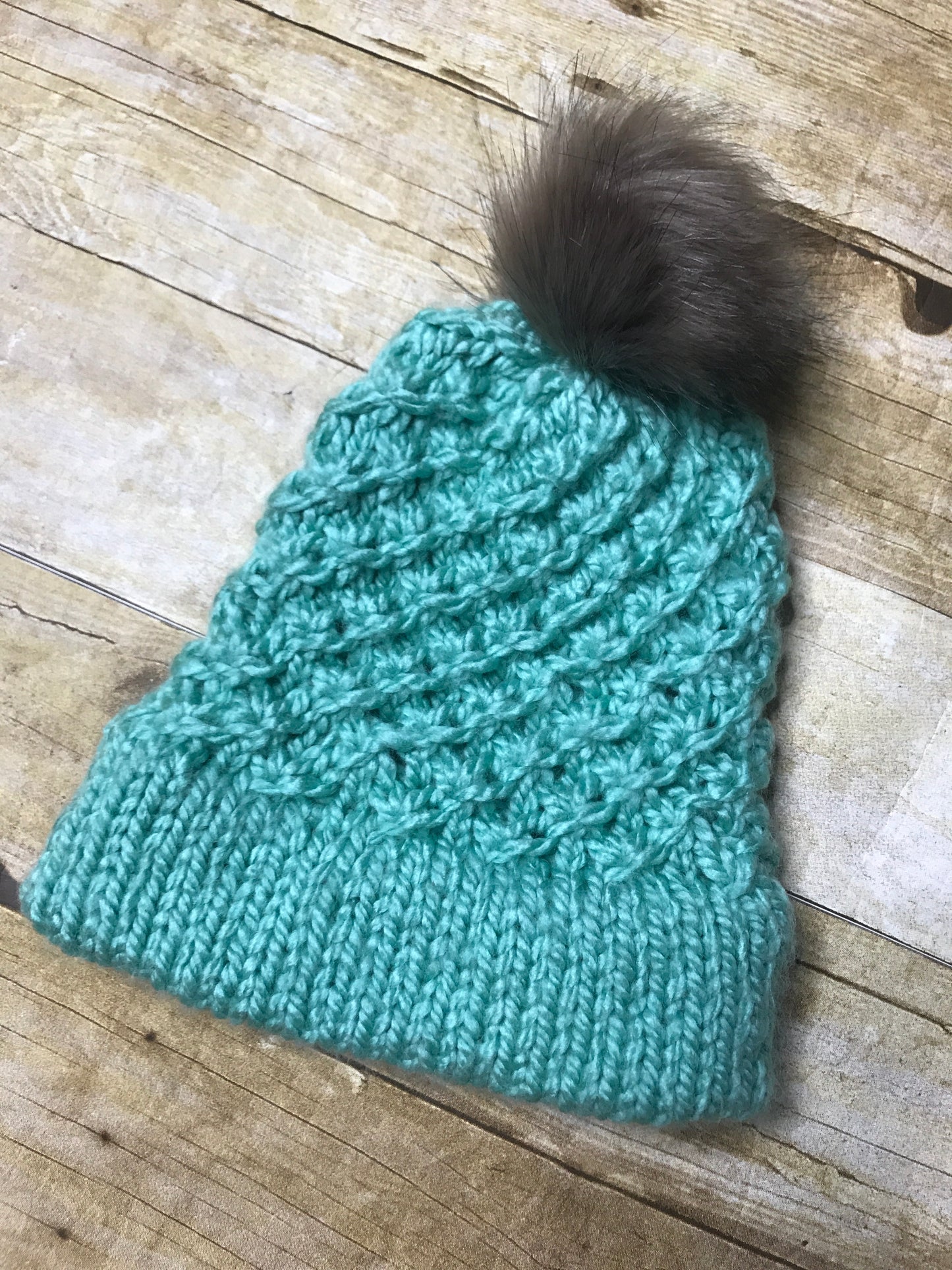 Hand knitted Teen/Adult size beanie hat Dark Mint green color with fur pop pom