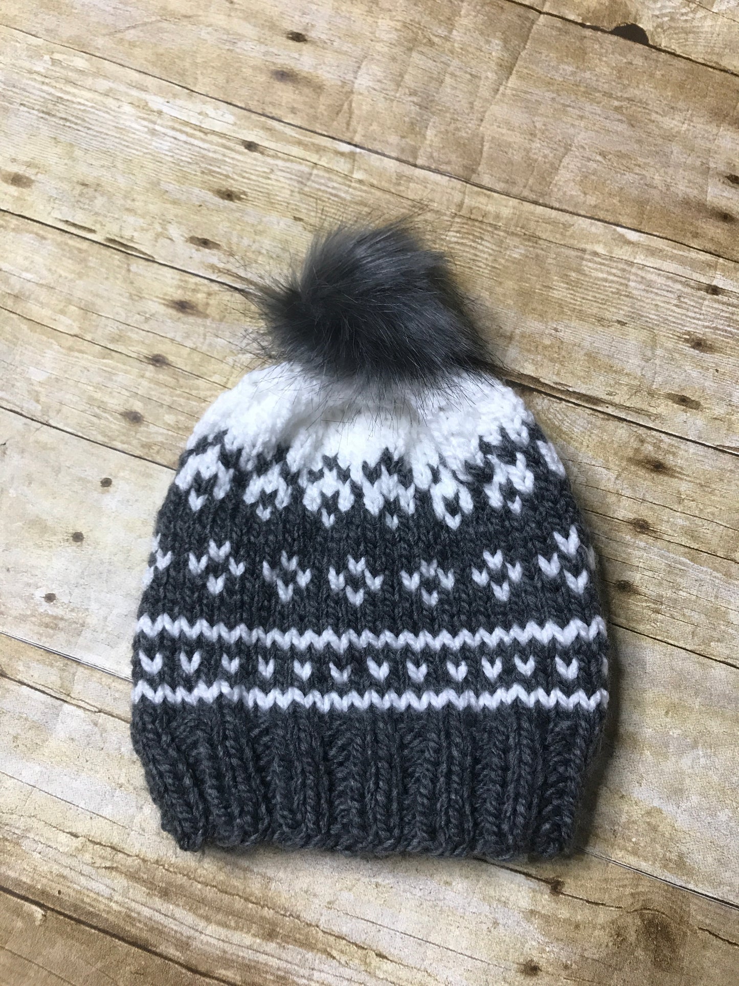 Hand knitted Adult size beanie hat Grey and white fair isle design with fur pop pom