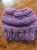 Hand knitted ponytail ladies purple beanie hat