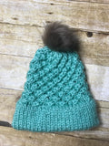 Hand knitted Teen/Adult size beanie hat Dark Mint green color with fur pop pom